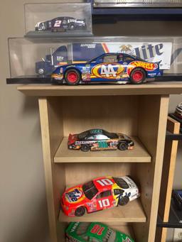 11 assorted die cast cars