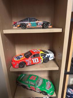 11 assorted die cast cars