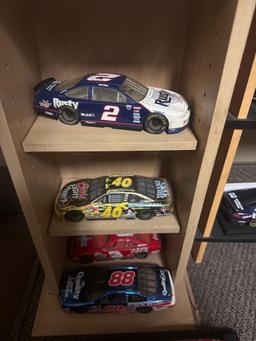 11 assorted die cast cars