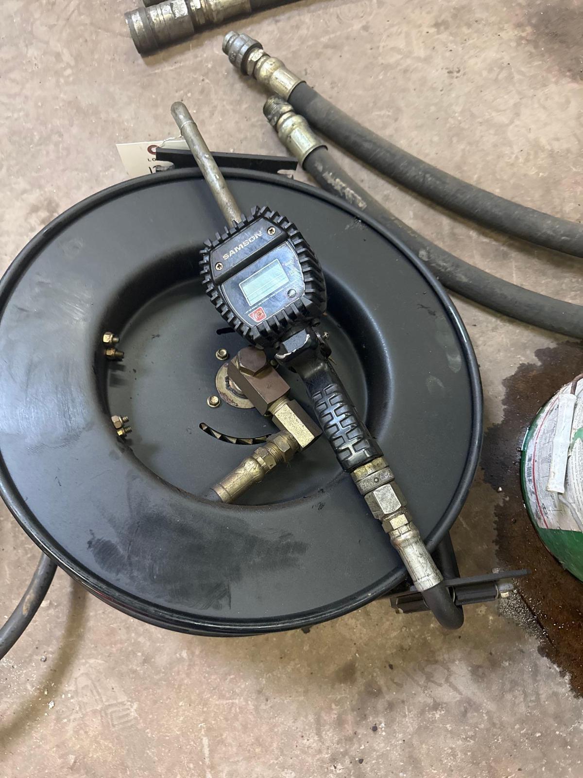 Retractable hose with Samson Oil dispensing nozzle