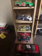11 assorted die cast cars