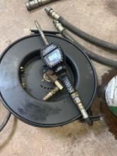 Retractable hose with Samson Oil dispensing nozzle