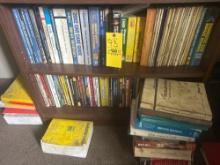 two shelves of assorted catalogues and Manuals