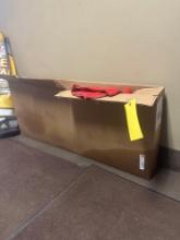 large box of bumper covers and rags
