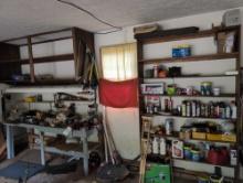 Contents of perimeter of garage, Garden tools, sprays, bench vice, misc tools, yard tools, see