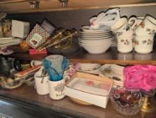 Contents under china cabinet, dishes, glassware, table setting items, decor