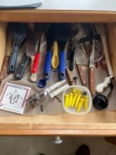 Assorted kitchen knives, pots, pans, silverware