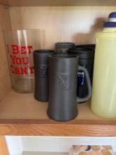 Playboy glasses, pitcher, silverware, decorative plates