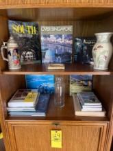World books, vase, stein