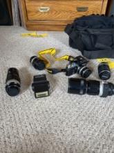 Nikon camera with accessories and carry bag