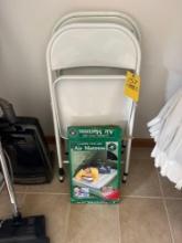 2 steel folding chairs and a air mattress
