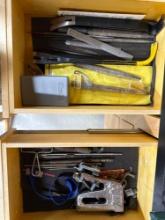 staple gun, paint kit, containers, files, misc