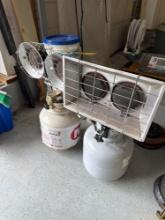 2 propane tanks with heater attachments