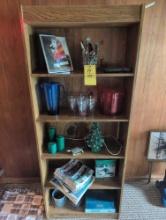 Press wood bookcase, bar stir sticks magazines, games