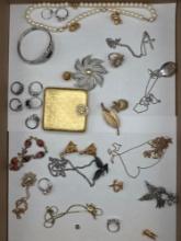 Assorted Costume Jewelry , including rings, brooches, necklaces
