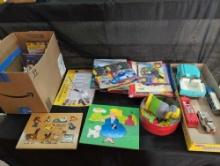 Press metal toys, vehicles, puzzles and assorted childrens books