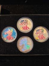Colorized silver eagle dollars, 1999-2000, bid x 4