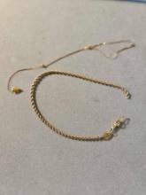 Two 14k yellow gold bracelets