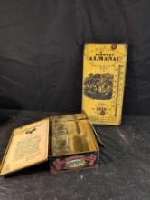 Farmer Almanac thermometer and Jack Daniels tin and glasses