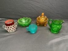Hickman bowl, Shoshone pitcher, sea shell and dolphin feet covered dish, red block