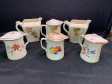 Group of vintage Harker Pottery pitchers