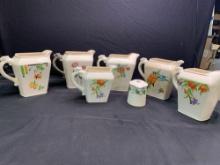 Group of vintage Harker Pottery pitchers