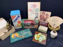 Coca Cola truck bank, pottery mold, advertising fan, tins