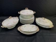 Limoges and Warwick porcelain tureens, plates and underplates