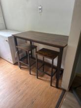 modern bar height table and two chairs