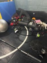 large lot of fitness equipment.