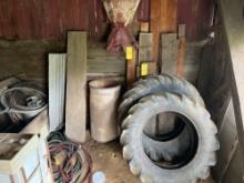 Contents of Corner - Tractor Tires, Barn Wood, Garden Hoses