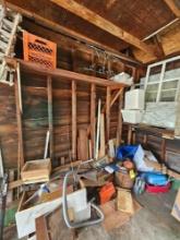 Garage Wall Section Contents - Lumber, Eureka Vacuum, Sports Items, & more
