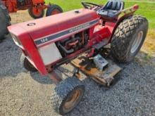 International 184 gas tractor with belly mower