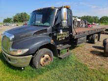 2002 International 4300 diesel tow roll off truck with tow bar