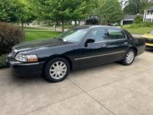 2009 Lincoln Town Car 126,610 miles. Daily driver