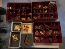 Large assortment of golden Christmas ornaments from the Danbury Mint