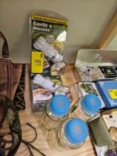 Garlic masters and glass bottles