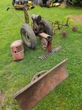 David Bradley tractor frame with cutterbar, blade, and cultivators