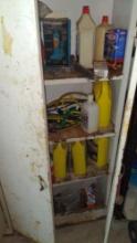 Metal cabinet in garage with contents