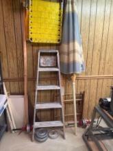 free weights, step ladder and umbrella