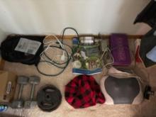 Contents of closet, weights, massager, assorted tops, jackets, belts