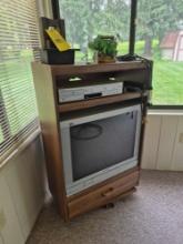 TV Cabinet, Panasonic TV, Samsung VHS/DVD Player, & Small Decor