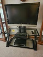 42 In. Vizio TV, Sony DVD/VHS Player, HQ DVD/VHS Player, & Z-Line Entertainment Stand