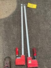 pair of Bessey clamps