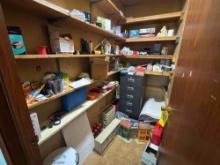Contents of closet including fisher price toy, early games, Legos, file cabinet, magazines, fluids