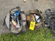 two tool bags fill of tools and hardware
