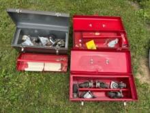 three metal tool boxes