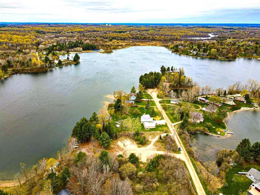 Two Adjacent Lots Just a Short Stroll from a Stunning 205-Acre Michigan Lake!