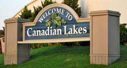 Build Your Dream Home in Thriving Canadian Lakes, Michigan!