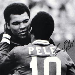 Pele & Ali Hug by Pele